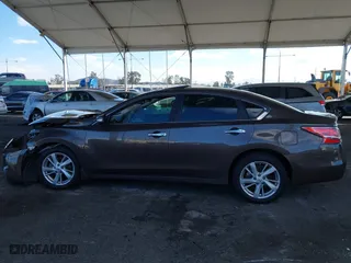 2015 Nissan Altima 2.5 SV with VIN 1N4AL3AP1FC169188, listed as a IAAI auction lot 41274644 with 82,222 mi miles. Bid and sale history available at carsss.com. Image 15.