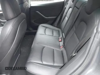 2022 Tesla Model 3 with VIN 5YJ3E1EA7NF339952, listed as a IAAI auction lot 38007332 with 10,726 mi miles. Bid and sale history available at carsss.com. Image 8.