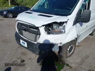 2023 Ford Transit Cargo with VIN 1FTBR1Y81PKB93787, listed as a IAAI auction lot 41253973 with 16,058 mi miles and . Bid and sale history available at DreamBid. Image 6.