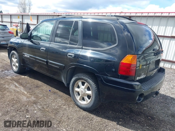 2005 GMC Envoy SLE with VIN 1GKDT13S552212811, listed as a IAAI auction lot 41996953 with 147,896 mi miles. Bid and sale history available at carsss.com. Image 3.