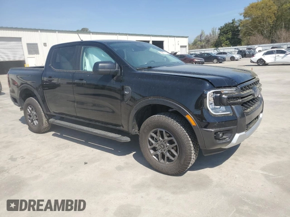 2024 Ford Ranger XLT with VIN 1FTER4HH7RLE02106, listed as a Copart auction lot 50977165 with 3,555 mi miles and Salvage title. Bid and sale history available at DreamBid. Image 4.