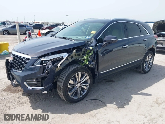 2024 Cadillac XT5 FWD Premium Luxury with VIN 1GYKNCR41RZ738779, listed as a IAAI auction lot 42266837 with 3,166 mi miles and . Bid and sale history available at DreamBid. Image 19.