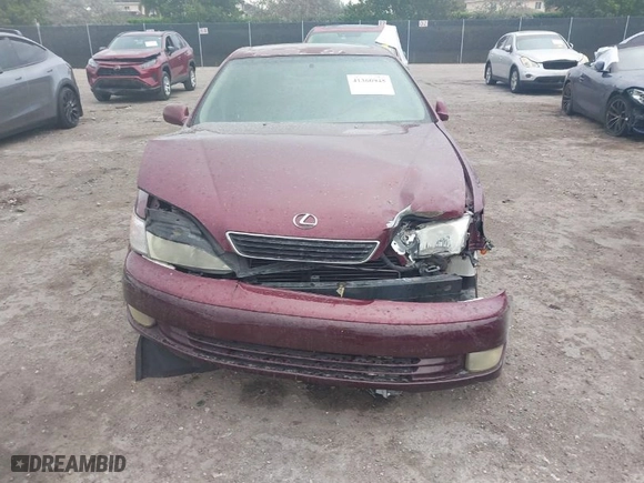 1998 Lexus ES 300 Luxury Sport Sdn with VIN JT8BF28G4W5015423, listed as a IAAI auction lot 41360945 with 308,738 mi miles. Bid and sale history available at carsss.com. Image 12.