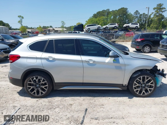 2021 BMW X1 sDrive28i with VIN WBXJG7C06M5T14235, listed as a IAAI auction lot 42021762 with 53,384 mi miles and . Bid and sale history available at DreamBid. Image 13.