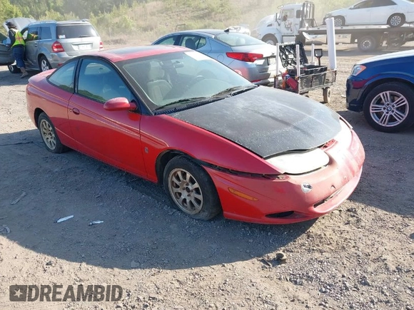 2002 Saturn SC with VIN 1G8ZY12742Z297685, listed as a IAAI auction lot 41930798 with Not Provided miles. Bid and sale history available at carsss.com. Image 1.