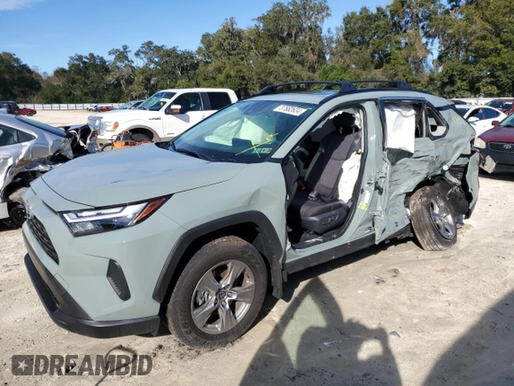 2023 Toyota RAV4 Hybrid XLE with VIN JTMRWRFV5PD196792, listed as a Copart auction lot 37882634 with 1,701 mi miles and Salvage Title. Bid and sale history available at carsss.com. Image 1.