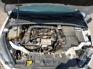 2018 Ford Focus SE with VIN 1FADP3FE0JL227146, listed as a Copart auction lot 56151985 with 124,517 mi miles and Salvage title. Bid and sale history available at DreamBid. Image 11.