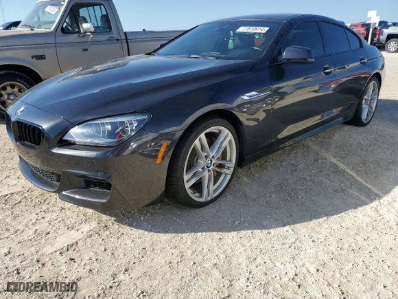 2015 BMW 6 Series 650i with VIN WBA6B2C58FD799063, listed as a Copart auction lot 77819914 with 0 mi miles and Salvage Title. Bid and sale history available at carsss.com. Image 1.