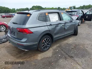 2021 Volkswagen Tiguan SE z VIN 3VV3B7AX8MM159316, wystawiony jako IAAI lot #42525546 z przebiegiem 70 141 mil mil oraz . Historia ofert i sprzedaży dostępna na DreamBid. Obrazek 4.