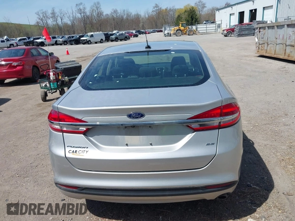 2018 Ford Fusion SE z VIN 3FA6P0H77JR226390, wystawiony jako IAAI lot #42120981 z przebiegiem 114 057 mil mil oraz . Historia ofert i sprzedaży dostępna na DreamBid. Obrazek 17.