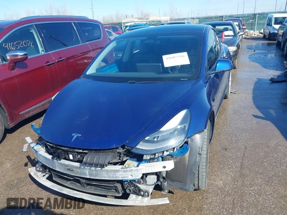 2021 Tesla Model 3 Long Range with VIN 5YJ3E1EB6MF990089, listed as a IAAI auction lot 41607316 with 25,223 mi miles and . Bid and sale history available at DreamBid. Image 13.