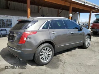 2019 Cadillac XT5 Luxury AWD with VIN 1GYKNDRS0KZ229941, listed as a Copart auction lot 49457315 with 48,856 mi miles and Salvage Title. Bid and sale history available at carsss.com. Image 3.