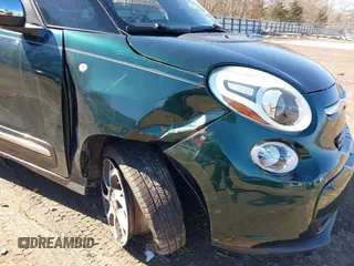2014 FIAT 500L Lounge with VIN ZFBCFACH8EZ005438, listed as a IAAI auction lot 41617634 with 36,714 mi miles and . Bid and sale history available at DreamBid. Image 6.