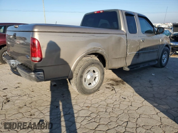 2001 Ford F-150 XL with VIN 1FTRX17L41NA96180, listed as a Copart auction lot 87309224 with 95,505 mi miles and Salvage title. Bid and sale history available at DreamBid. Image 3.