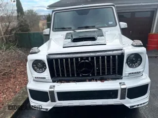 2002 Mercedes-Benz G-Class with VIN WDCYR49E22X132146, listed as a Copart auction lot 87416074 with 208,917 mi miles and Salvage Title. Bid and sale history available at carsss.com. Image 7.