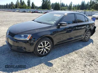 2014 Volkswagen Jetta SE with VIN 3VWD17AJ2EM397825, listed as a Copart auction lot 64076595 with 61,691 mi miles and Salvage title. Bid and sale history available at DreamBid. Image 1.
