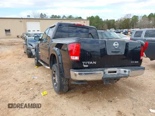 2012 Nissan Titan S with VIN 1N6AA0EC1CN322929, listed as a IAAI auction lot 41792414 with 124,182 mi miles. Bid and sale history available at carsss.com. Image 3.