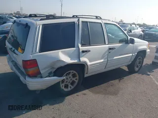 1998 Jeep Grand Cherokee with VIN 1J4FX78S2WC281501, listed as a IAAI auction lot 42140170 with 177,575 mi miles and . Bid and sale history available at DreamBid. Image 4.