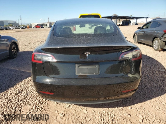 2021 Tesla Model 3 Standard Range Plus with VIN 5YJ3E1EA3MF996701, listed as a Copart auction lot 47013195 with 34,177 mi miles and Salvage Title. Bid and sale history available at carsss.com. Image 6.