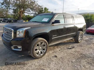 2019 GMC Yukon XL Denali with VIN 1GKS2HKJ2KR226275, listed as a IAAI auction lot 41552828 with 82,069 mi miles. Bid and sale history available at carsss.com. Image 18.