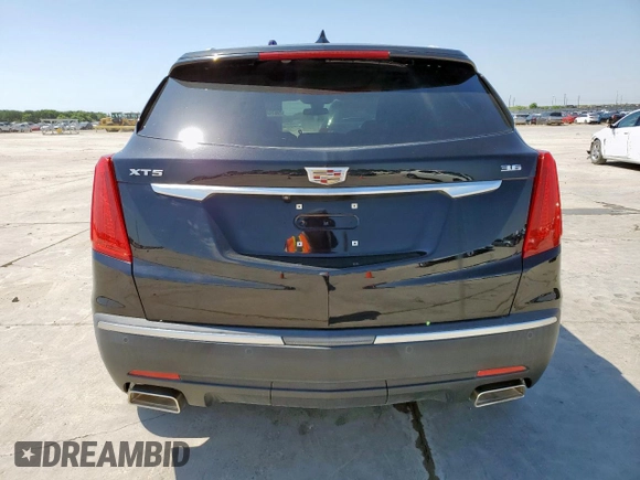 2019 Cadillac XT5 Luxury FWD z VIN 1GYKNCRS0KZ112080, wystawiony jako Copart lot #56705995 z przebiegiem 41 891 mil mil oraz Szkoda całkowita • Salvage title. Historia ofert i sprzedaży dostępna na DreamBid. Obrazek 6.