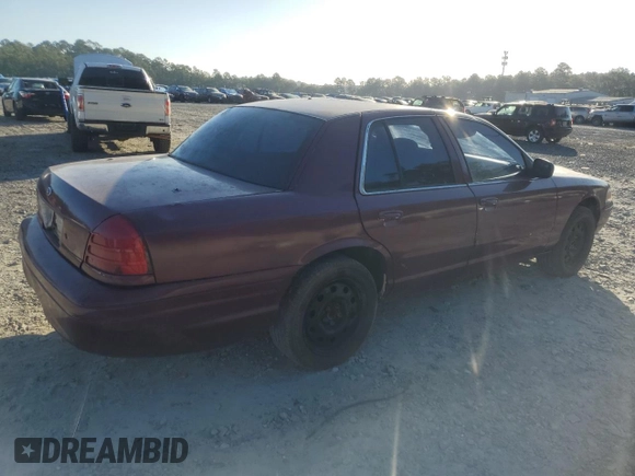 2006 Ford Police Interceptor with VIN 2FAFP71W06X165970, listed as a Copart auction lot 76293344 with 180,661 mi miles and Salvage title. Bid and sale history available at DreamBid. Image 3.