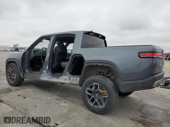 2022 Rivian R1T Launch Edition with VIN 7FCTGAAL7NN002288, listed as a Copart auction lot 43393815 with 46,927 mi miles and Salvage Title. Bid and sale history available at carsss.com. Image 2.