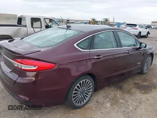 2017 Ford Fusion Titanium with VIN 3FA6P0SU3HR208641, listed as a IAAI auction lot 41732983 with 80,428 mi miles and . Bid and sale history available at DreamBid. Image 4.