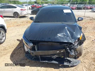 2023 Kia Forte GT-Line z VIN 3KPF54AD2PE685043, wystawiony jako IAAI lot #42041237 z przebiegiem 25 750 mil mil oraz . Historia ofert i sprzedaży dostępna na DreamBid. Obrazek 13.