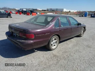 1996 Chevrolet Caprice Classic 1SA Special Value Pkg with VIN 1G1BL52P9TR184810, listed as a IAAI auction lot 41831242 with 1 mi miles. Bid and sale history available at carsss.com. Image 4.