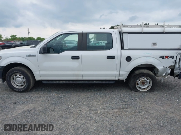 2019 Ford F-150 XL with VIN 1FTEW1EB0KFB01334, listed as a IAAI auction lot 42090740 with 79,881 mi miles and . Bid and sale history available at DreamBid. Image 14.