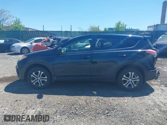 2017 Toyota RAV4 LE with VIN JTMBFREV8HJ168975, listed as a IAAI auction lot 42139354 with 91,394 mi miles and . Bid and sale history available at DreamBid. Image 14.