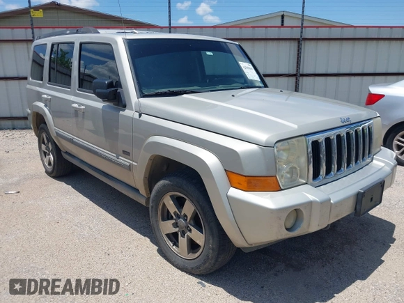 2007 Jeep Commander Sport z VIN 1J8HH48K47C699904, wystawiony jako IAAI lot #42509665 z przebiegiem 198 539 mil mil oraz . Historia ofert i sprzedaży dostępna na DreamBid. Obrazek 1.