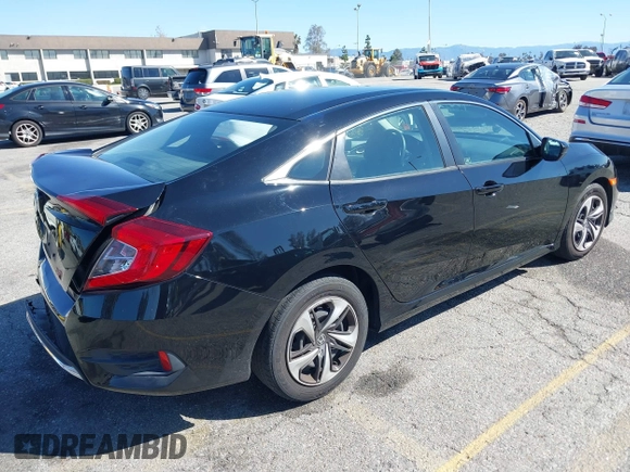 2020 Honda Civic LX z VIN 19XFC2F6XLE212683, wystawiony jako IAAI lot #41745743 z przebiegiem 81 553 mil mil oraz . Historia ofert i sprzedaży dostępna na DreamBid. Obrazek 4.
