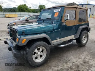 1998 Jeep Wrangler SE with VIN 1J4FY29P1WP795603, listed as a Copart auction lot 56667205 with 157,130 mi miles and Salvage title. Bid and sale history available at DreamBid. Image 1.