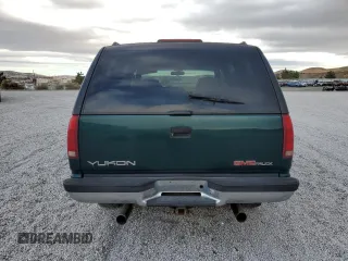 1996 GMC Yukon with VIN 1GKEK13R6TJ747606, listed as a Copart auction lot 80763434 with 308,837 mi miles and Salvage Title. Bid and sale history available at carsss.com. Image 6.