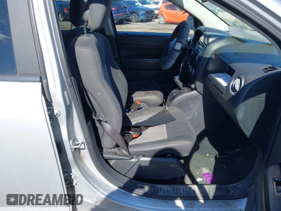 2012 Jeep Compass Sport with VIN 1C4NJDBB0CD590268, listed as a IAAI auction lot 41856474 with 148,627 mi miles. Bid and sale history available at carsss.com. Image 5.
