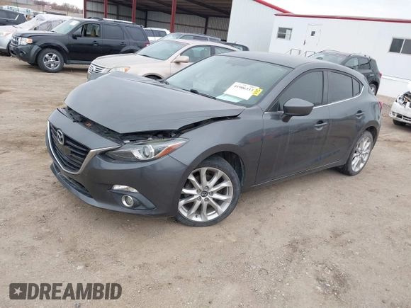 2014 Mazda 3 S Touring with VIN JM1BM1L30E1200337, listed as a IAAI auction lot 41906333 with 92,873 mi miles and . Bid and sale history available at DreamBid. Image 2.
