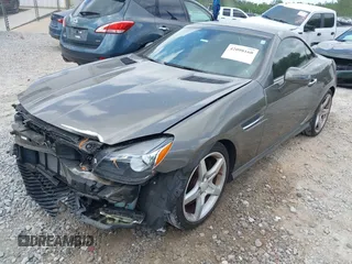 2015 Mercedes-Benz SLK 250 z VIN WDDPK4HA5FF110938, wystawiony jako IAAI lot #42098160 z przebiegiem 46 779 mil mil oraz . Historia ofert i sprzedaży dostępna na DreamBid. Obrazek 2.