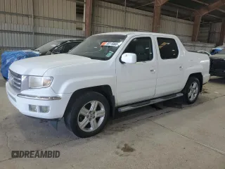 2012 Honda Ridgeline RTL z VIN 5FPYK1F57CB453079, wystawiony jako Copart lot #60115065 z przebiegiem 154 581 mil mil oraz Szkoda całkowita • Salvage title. Historia ofert i sprzedaży dostępna na DreamBid. Obrazek 1.