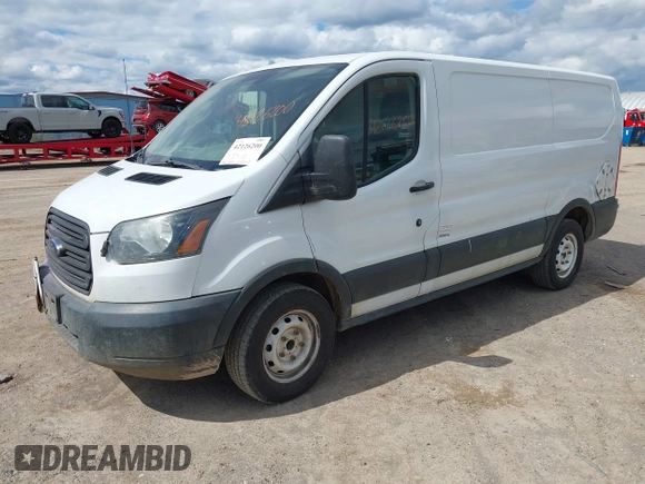 2015 Ford Transit Cargo z VIN 1FTNE1YM7FKB14241, wystawiony jako IAAI lot #42126200 z przebiegiem 314 744 mil mil oraz . Historia ofert i sprzedaży dostępna na DreamBid. Obrazek 2.