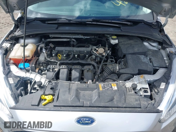 2017 Ford Focus SE with VIN 1FADP3F25HL335102, listed as a IAAI auction lot 42010697 with 77,389 mi miles. Bid and sale history available at carsss.com. Image 10.