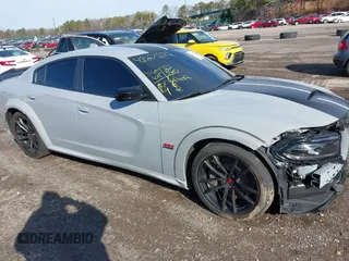 2022 Dodge Charger Scat Pack Widebody with VIN 2C3CDXGJ6NH176650, listed as a IAAI auction lot 41863122 with 34,569 mi miles and . Bid and sale history available at DreamBid. Image 13.