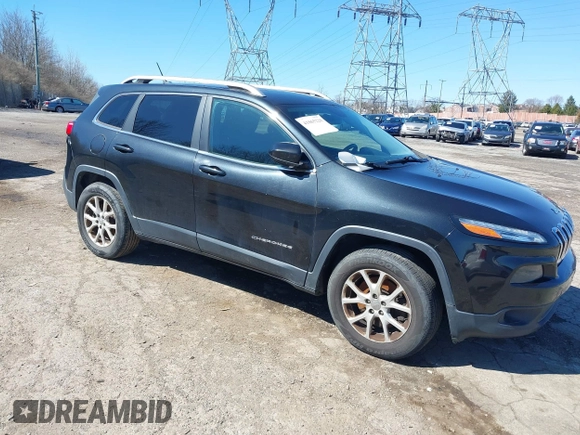 2015 Jeep Cherokee Latitude z VIN 1C4PJMCS2FW620113, wystawiony jako IAAI lot #41865228 z przebiegiem 186 983 mil mil oraz . Historia ofert i sprzedaży dostępna na DreamBid. Obrazek 1.