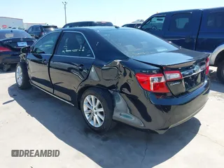 2012 Toyota Camry SE with VIN 4T1BK1FK5CU518616, listed as a IAAI auction lot 41981676 with 116,845 mi miles. Bid and sale history available at carsss.com. Image 3.