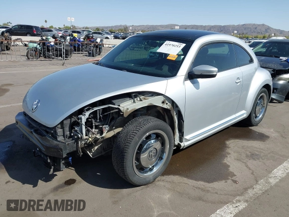 2013 Volkswagen Beetle 2.5L w/Sun/Sound/Nav with VIN 3VWJX7AT5DM606119, listed as a IAAI auction lot 41970253 with 81,004 mi miles and . Bid and sale history available at DreamBid. Image 18.