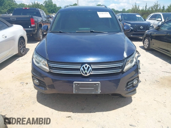 2012 Volkswagen Tiguan SE with VIN WVGAV7AX7CW534703, listed as a IAAI auction lot 42463358 with 119,699 mi miles and . Bid and sale history available at DreamBid. Image 12.