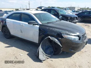 2013 Ford Sedan Police Interceptor with VIN 1FAHP2MK8DG188842, listed as a IAAI auction lot 41787680 with 104,140 mi miles. Bid and sale history available at carsss.com. Image 1.