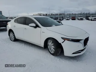 2021 Mazda 3 2.5 Turbo with VIN JM1BPBAY5M1308950, listed as a Copart auction lot 87502495 with 62,843 mi miles and Salvage Title. Bid and sale history available at DreamBid. Image 4.