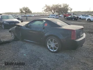 2006 Cadillac XLR z VIN 1G6YV36A665602969, wystawiony jako Copart lot #84533034 z przebiegiem Nie podano mil oraz Szkody całkowita. Historia ofert i sprzedaży dostępna na DreamBid. Obrazek 2.